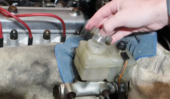 Remove the Cap from the Brake Fluid Reservoir