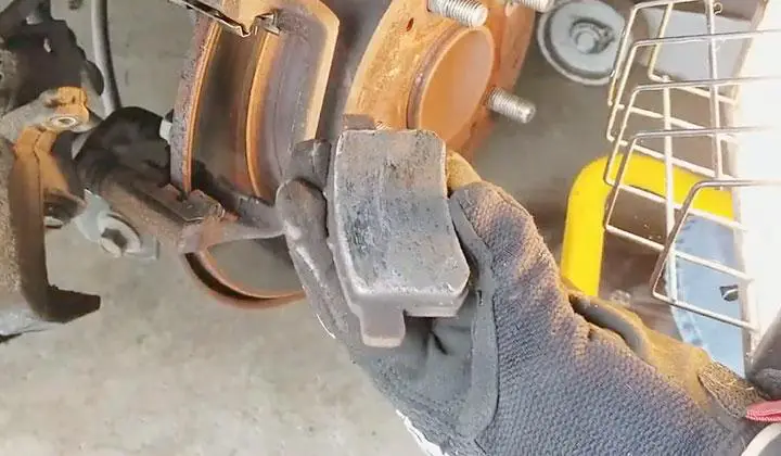 Slide Out the Old Brake Pads