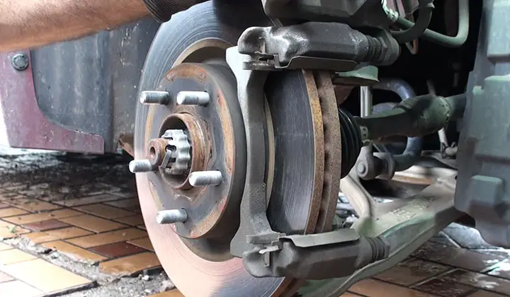 pull the brake pads off of the rotors