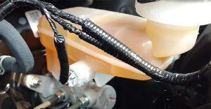 Why Is Brake Fluid Leaking From Rear Wheel? - Brake Pad Boss