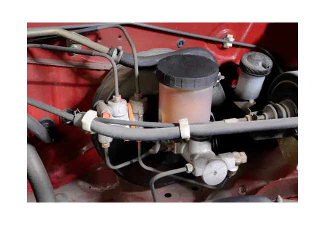 how to remove brake fluid reservoir from master cylinder